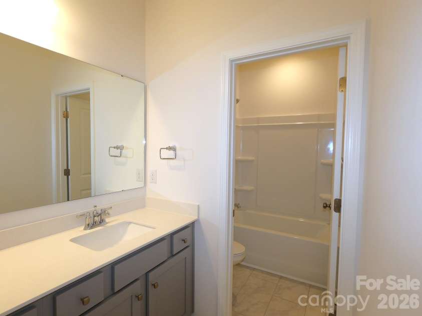 217 Amber Glen Drive, Locust, NC 28097.  MLS# CAR4373453, YatesRealty ID 21226. Secondary bathroom