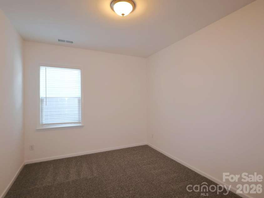 12113 Avienmore Drive, Charlotte, NC 28278.  MLS# CAR4345161, YatesRealty ID 21228. Secondary bedroom