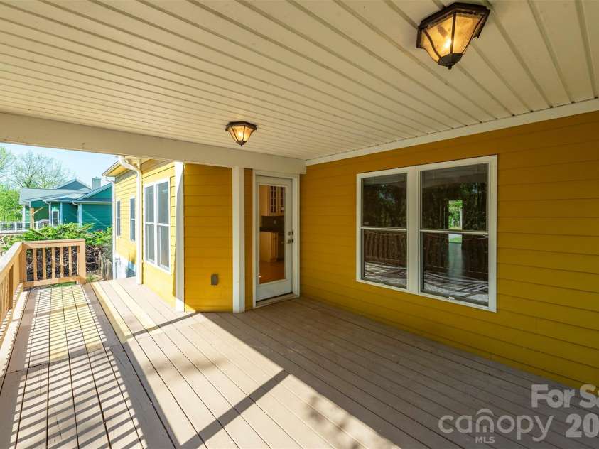 75 Noble Road, Fairview, NC 28730.  MLS# CAR4351168, YatesRealty ID 21230. Great fairly private deck