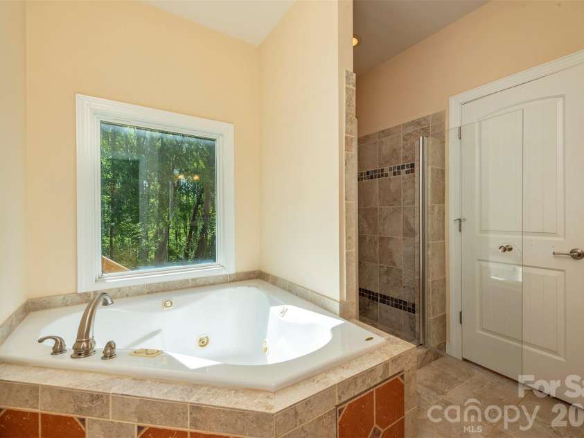 75 Noble Road, Fairview, NC 28730.  MLS# CAR4351168, YatesRealty ID 21230. Primary Bathroom