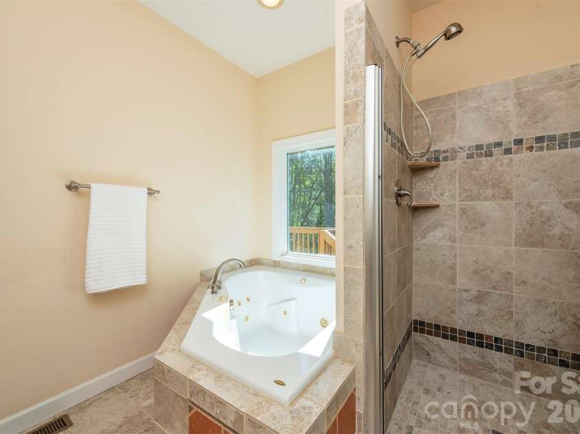75 Noble Road, Fairview, NC 28730.  MLS# CAR4351168, YatesRealty ID 21230. Primary Bathrrom
