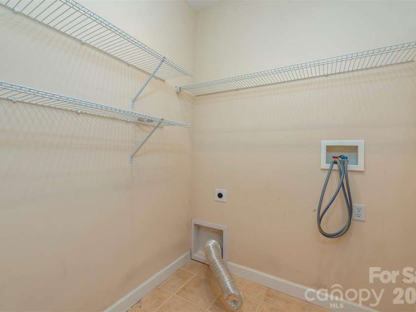 75 Noble Road, Fairview, NC 28730.  MLS# CAR4351168, YatesRealty ID 21230. Seperate Laundry room