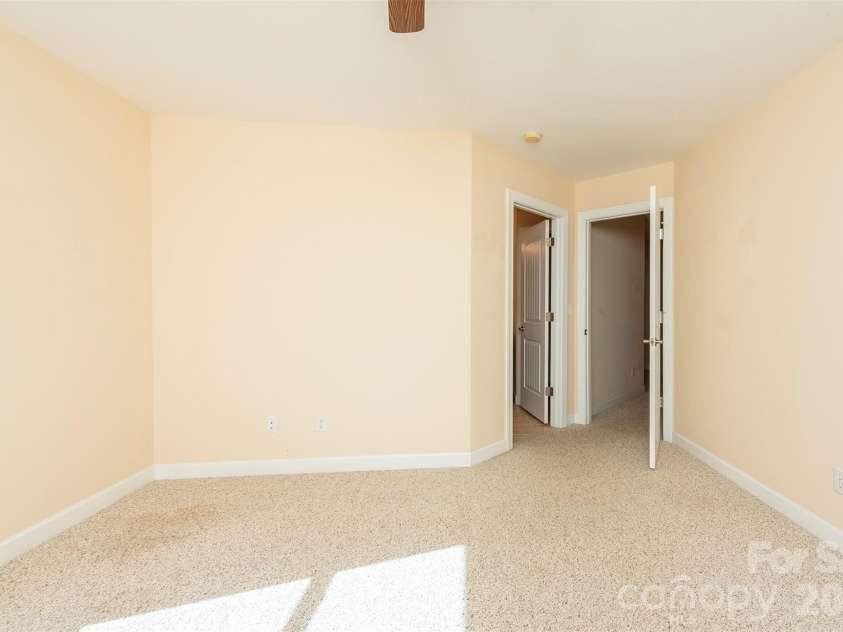 75 Noble Road, Fairview, NC 28730.  MLS# CAR4351168, YatesRealty ID 21230. Upper level bedroom