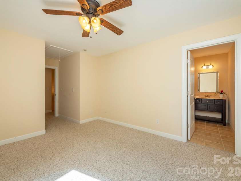 75 Noble Road, Fairview, NC 28730.  MLS# CAR4351168, YatesRealty ID 21230. Upper level bedroom