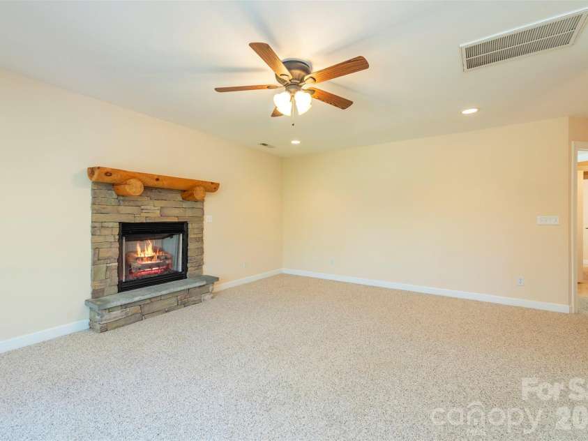 75 Noble Road, Fairview, NC 28730.  MLS# CAR4351168, YatesRealty ID 21230. Upstairs media area