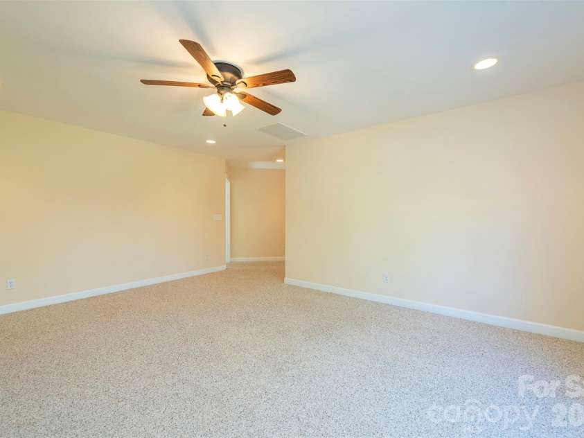 75 Noble Road, Fairview, NC 28730.  MLS# CAR4351168, YatesRealty ID 21230. Upstairs media area