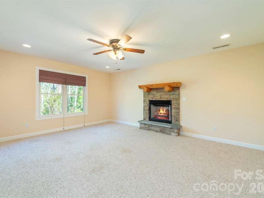75 Noble Road, Fairview, NC 28730.  MLS# CAR4351168, YatesRealty ID 21230. Upstairs nedia area