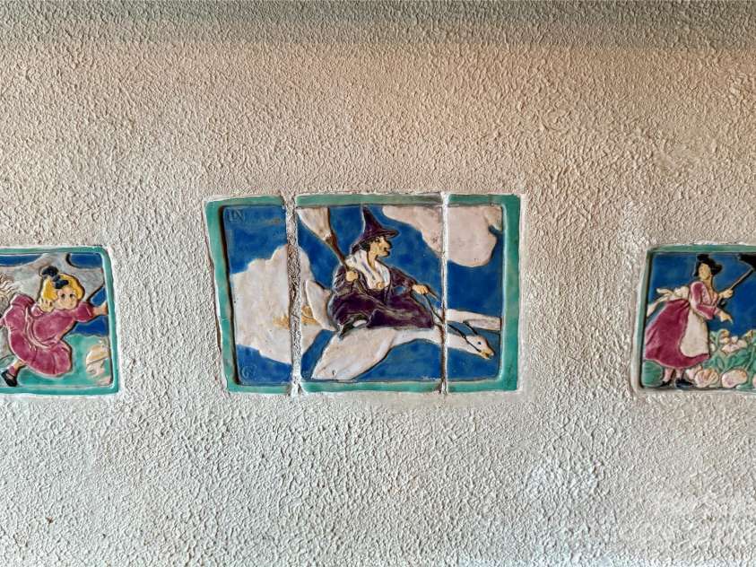 43 Howard Street, Tryon, NC 28782.  MLS# CAR4268057, YatesRealty ID 21234. Toy House detail of Mother Goose tiles