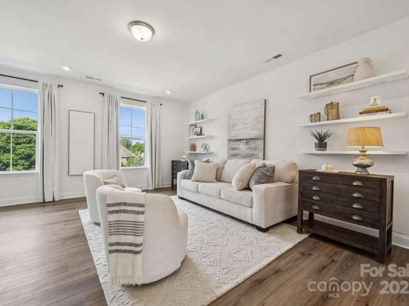 4148 Alexander View Drive, Charlotte, NC 28226.  MLS# CAR4270860, YatesRealty ID 21239. Living room with tons of natural light