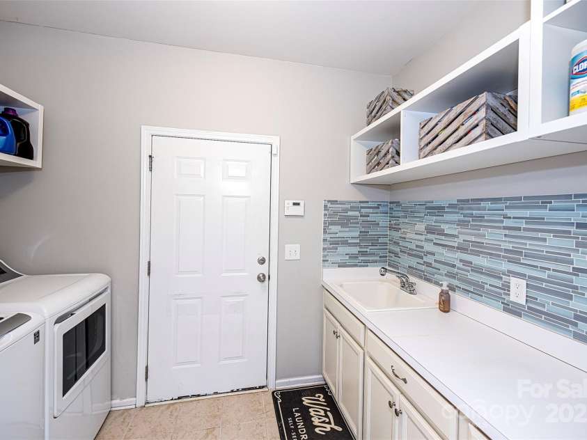 246 Sweet Briar Drive, Fort Mill, SC 29707.  MLS# CAR4234159, YatesRealty ID 21242. Laundry Room.