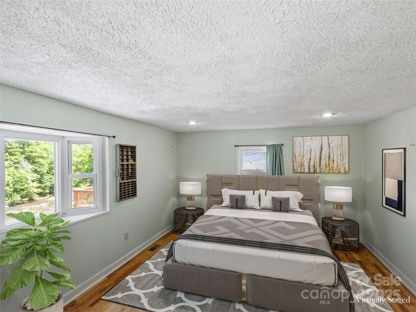 12982 US Hwy 19W None, Burnsville, NC 28714.  MLS# CAR4234088, YatesRealty ID 21243. Primary bedroom with walk in closet 