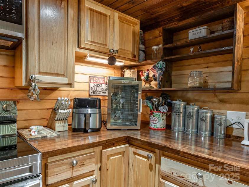 12982 US Hwy 19W None, Burnsville, NC 28714.  MLS# CAR4234088, YatesRealty ID 21243. Wood counter tops