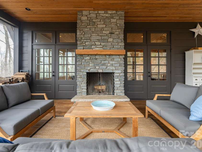 51 Summit Road, Swannanoa, NC 28778.  MLS# CAR4367888, YatesRealty ID 21243. Screened in porch with heaters