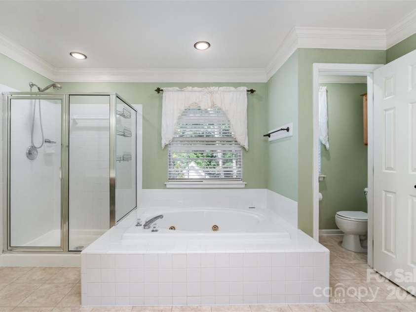 1002 Hollyhedge Lane, Indian Trail, NC 28079.  MLS# CAR4269454, YatesRealty ID 21244. Primary Bathroom
