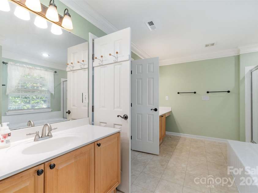 1002 Hollyhedge Lane, Indian Trail, NC 28079.  MLS# CAR4269454, YatesRealty ID 21244. Primary Bathroom