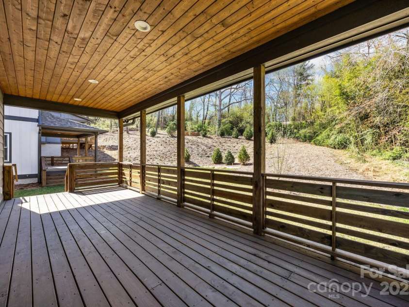 87 Glendale Avenue, Asheville, NC 28803.  MLS# CAR4145550, YatesRealty ID 2125. Expansive covered back deck