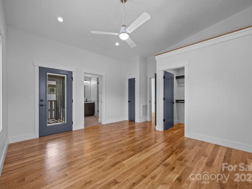 87 Glendale Avenue, Asheville, NC 28803.  MLS# CAR4145550, YatesRealty ID 2125. Primary bedroom with deck, walk in closet and full bath