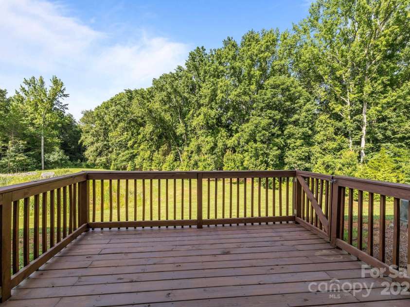 853 Gerard Bay Drive, Fort Mill, SC 29715.  MLS# CAR4268298, YatesRealty ID 21257. Great view of green space behind home