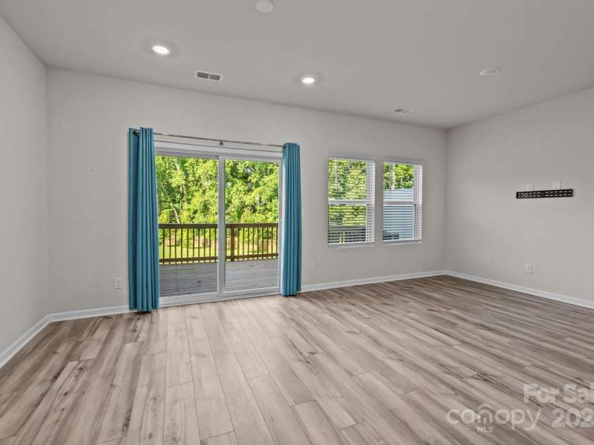 853 Gerard Bay Drive, Fort Mill, SC 29715.  MLS# CAR4268298, YatesRealty ID 21257. Large great room for entertaining