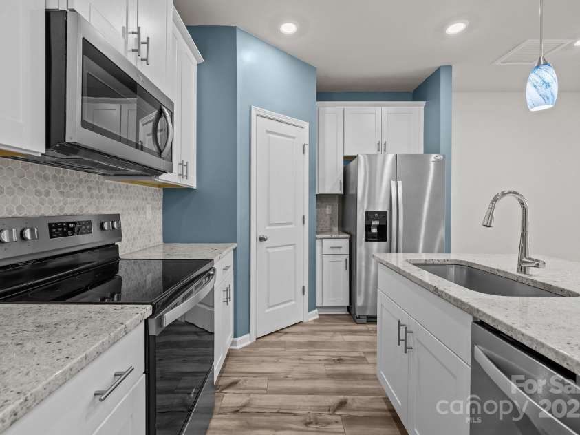 853 Gerard Bay Drive, Fort Mill, SC 29715.  MLS# CAR4268298, YatesRealty ID 21257. Quartz countertops, stainless appliances