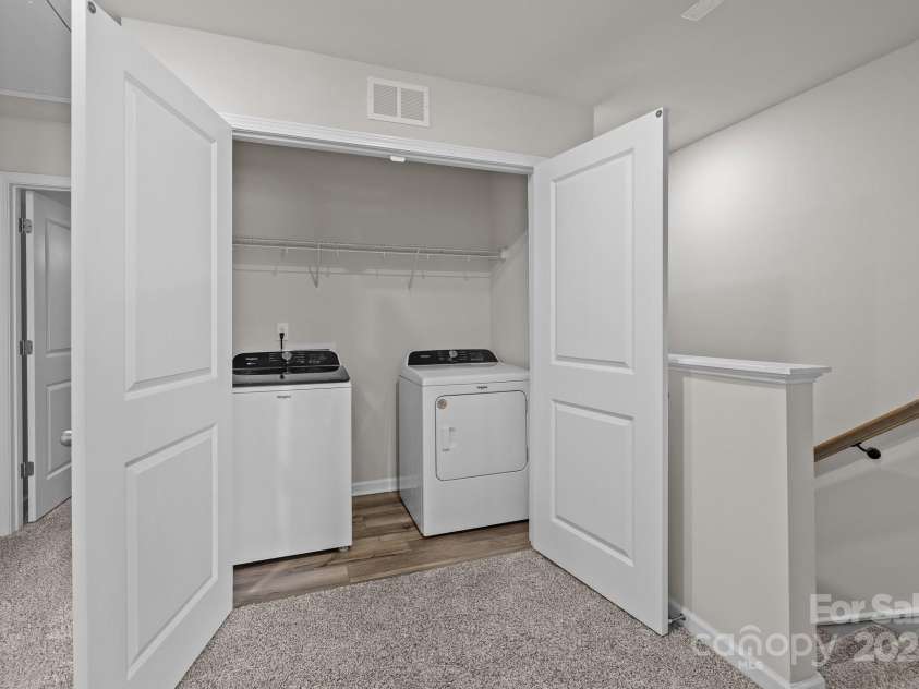 853 Gerard Bay Drive, Fort Mill, SC 29715.  MLS# CAR4268298, YatesRealty ID 21257. Upstairs laundry