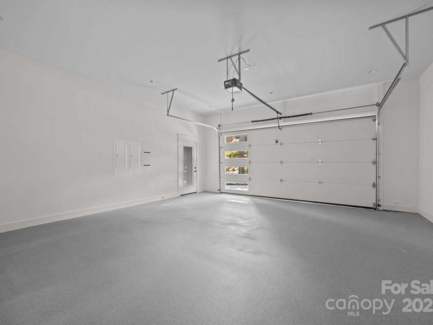 58 Pinedale Road, Asheville, NC 28805.  MLS# CAR4320485, YatesRealty ID 2126. 2 car garage with epoxy floors