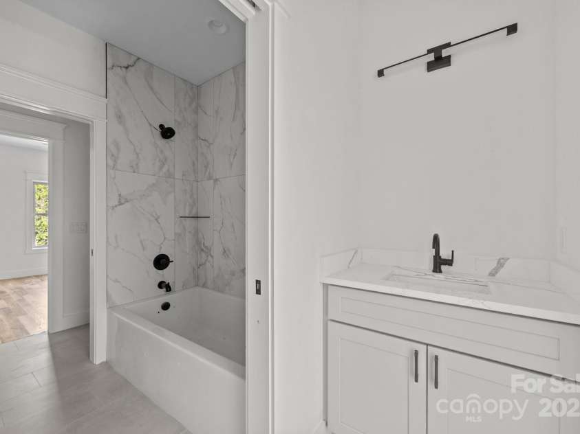 58 Pinedale Road, Asheville, NC 28805.  MLS# CAR4320485, YatesRealty ID 2126. Hall bath adjoins bedrooms 2 and 3