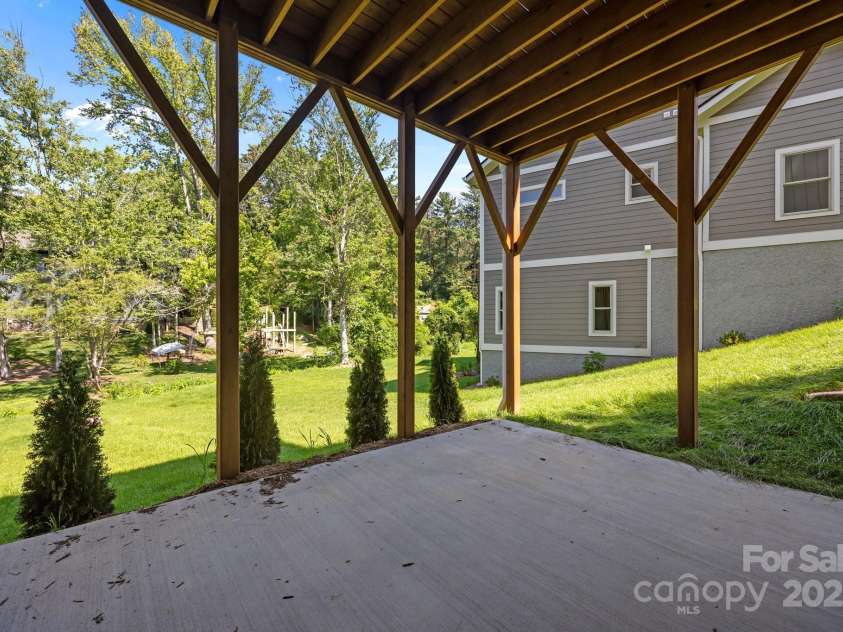 58 Pinedale Road, Asheville, NC 28805.  MLS# CAR4320485, YatesRealty ID 2126. Lower level patio