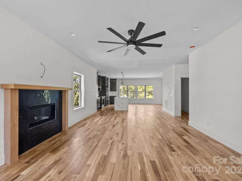 58 Pinedale Road, Asheville, NC 28805.  MLS# CAR4320485, YatesRealty ID 2126. Open floor plans leads you through the living room to the kitchen and dining area