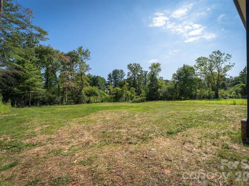 808 Maybank Drive, Hendersonville, NC 28739.  MLS# CAR4401111, YatesRealty ID 21260. Private backyard