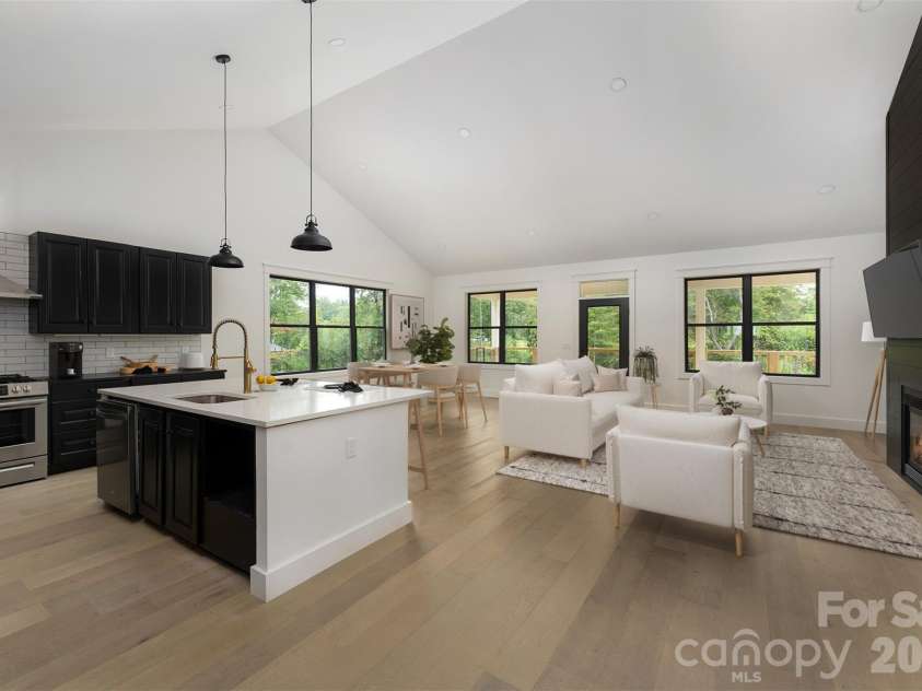 808 Maybank Drive, Hendersonville, NC 28739.  MLS# CAR4401111, YatesRealty ID 21260. Virtually staged open concept with gas fireplace