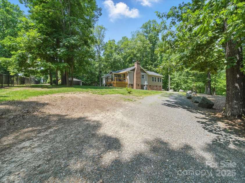 2345 Stallings Road, Matthews, NC 28104.  MLS# CAR4268462, YatesRealty ID 21262. 
