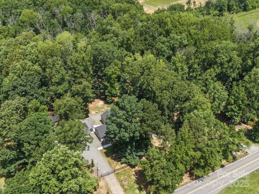 2345 Stallings Road, Matthews, NC 28104.  MLS# CAR4268462, YatesRealty ID 21262. 
