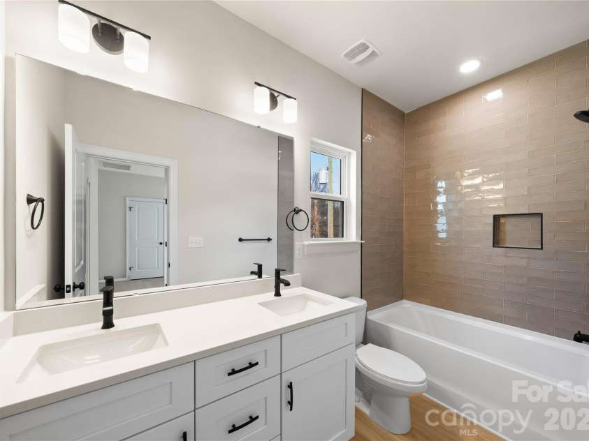 9115 Old Moores Chapel Road, Charlotte, NC 28214.  MLS# CAR4358866, YatesRealty ID 21267. 9115 Second full bath on upper