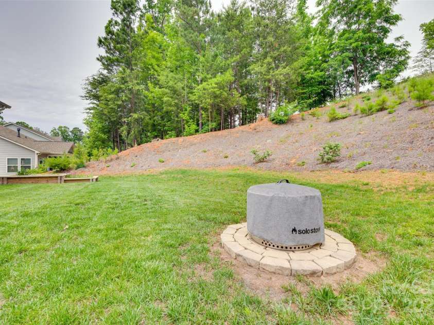 15298 Windward Lane, Lancaster, SC 29720.  MLS# CAR4214358, YatesRealty ID 21268. Fire Pit & Back Yar