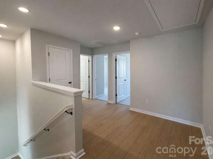585 Cape Cod Way, Rock Hill, SC 29732.  MLS# CAR4361253, YatesRealty ID 21268. LVP throughout the Loft Retreat