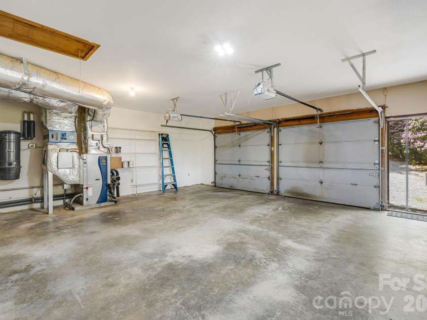 24 Smokey Road, Asheville, NC 28803.  MLS# CAR4371941, YatesRealty ID 21269. Garage