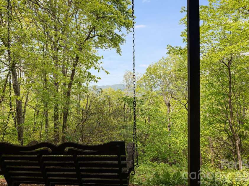 24 Smokey Road, Asheville, NC 28803.  MLS# CAR4371941, YatesRealty ID 21269. View from swing