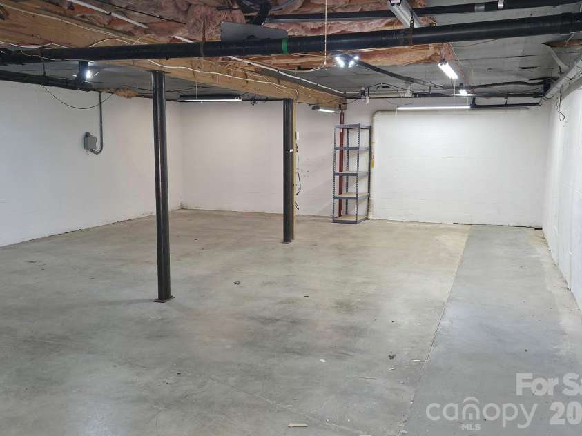 132 Serenity Circle, Hendersonville, NC 28792.  MLS# CAR4378442, YatesRealty ID 21270. BASEMENT/GARAGE