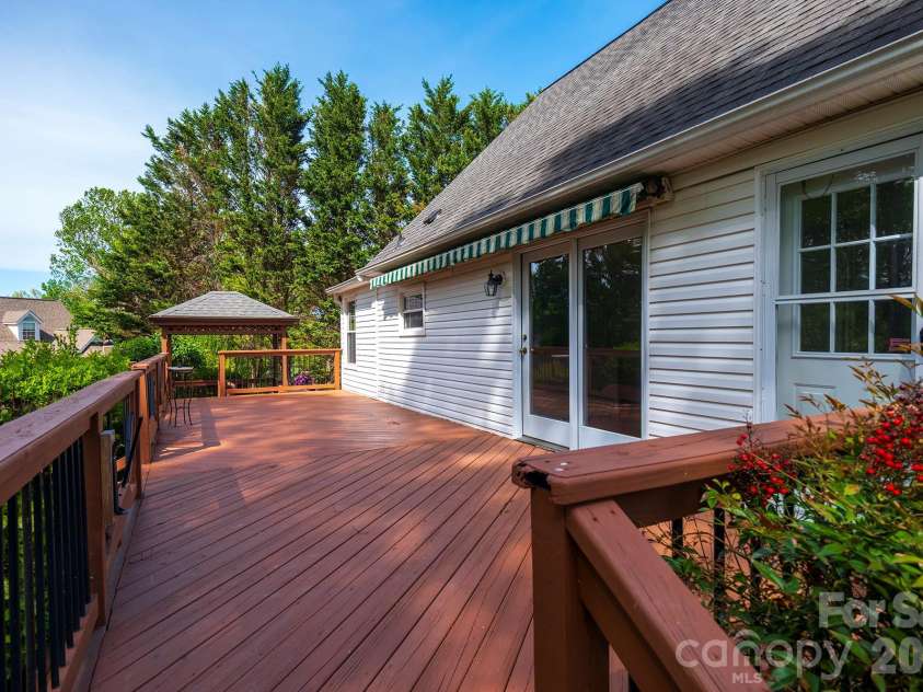 132 Serenity Circle, Hendersonville, NC 28792.  MLS# CAR4378442, YatesRealty ID 21270. EXPANSIVE BACK DECK