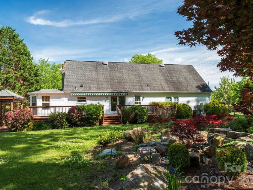 132 Serenity Circle, Hendersonville, NC 28792.  MLS# CAR4378442, YatesRealty ID 21270. PRIVATE PARADISE