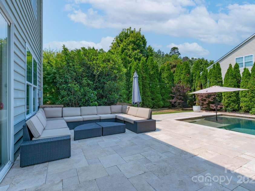 1211 Gold Rush Court, Fort Mill, SC 29708.  MLS# CAR4264284, YatesRealty ID 21275. Grab your book and enjoy the privacy of this back patio