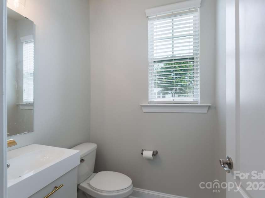 1211 Gold Rush Court, Fort Mill, SC 29708.  MLS# CAR4264284, YatesRealty ID 21275. Half bath on main level