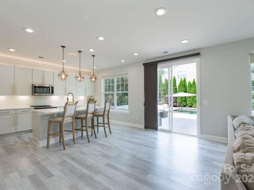 1211 Gold Rush Court, Fort Mill, SC 29708.  MLS# CAR4264284, YatesRealty ID 21275. Kitchen and door to back patio