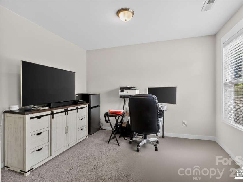 10012 Michael Crossing Drive, Charlotte, NC 28213.  MLS# CAR4358230, YatesRealty ID 21283. Primary suite includes a private sitting area with flexible space