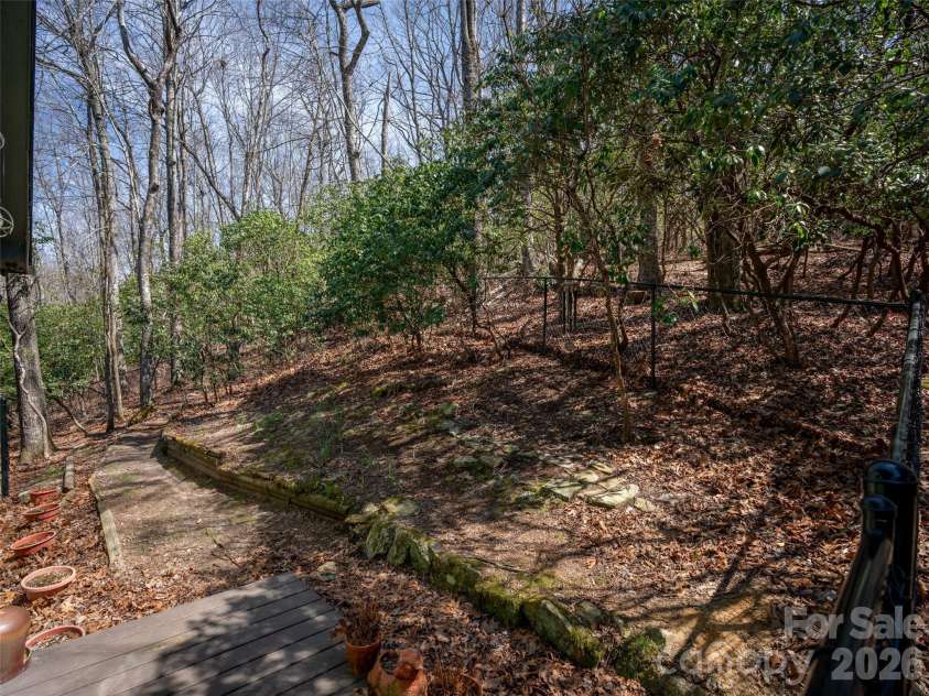 31 Elseetos Drive, Brevard, NC 28712.  MLS# CAR4360165, YatesRealty ID 21286. Fenced Backyard. Perfect for pups!
