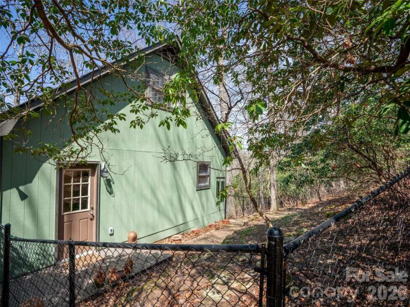31 Elseetos Drive, Brevard, NC 28712.  MLS# CAR4360165, YatesRealty ID 21286. Fenced Backyard. Perfect for pups!