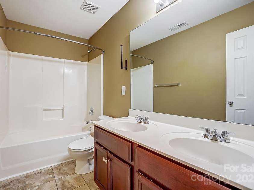 5713 Falkirk Lane, Matthews, NC 28104.  MLS# CAR4243760, YatesRealty ID 21287. Full Bath Upper