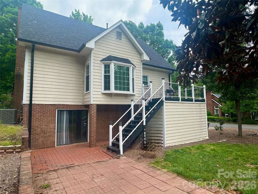 4116 Moss Brook Drive, Winston Salem, NC 27127.  MLS# CAR4380282, YatesRealty ID 21288. Rear view