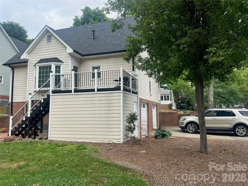 4116 Moss Brook Drive, Winston Salem, NC 27127.  MLS# CAR4380282, YatesRealty ID 21288. Rear View